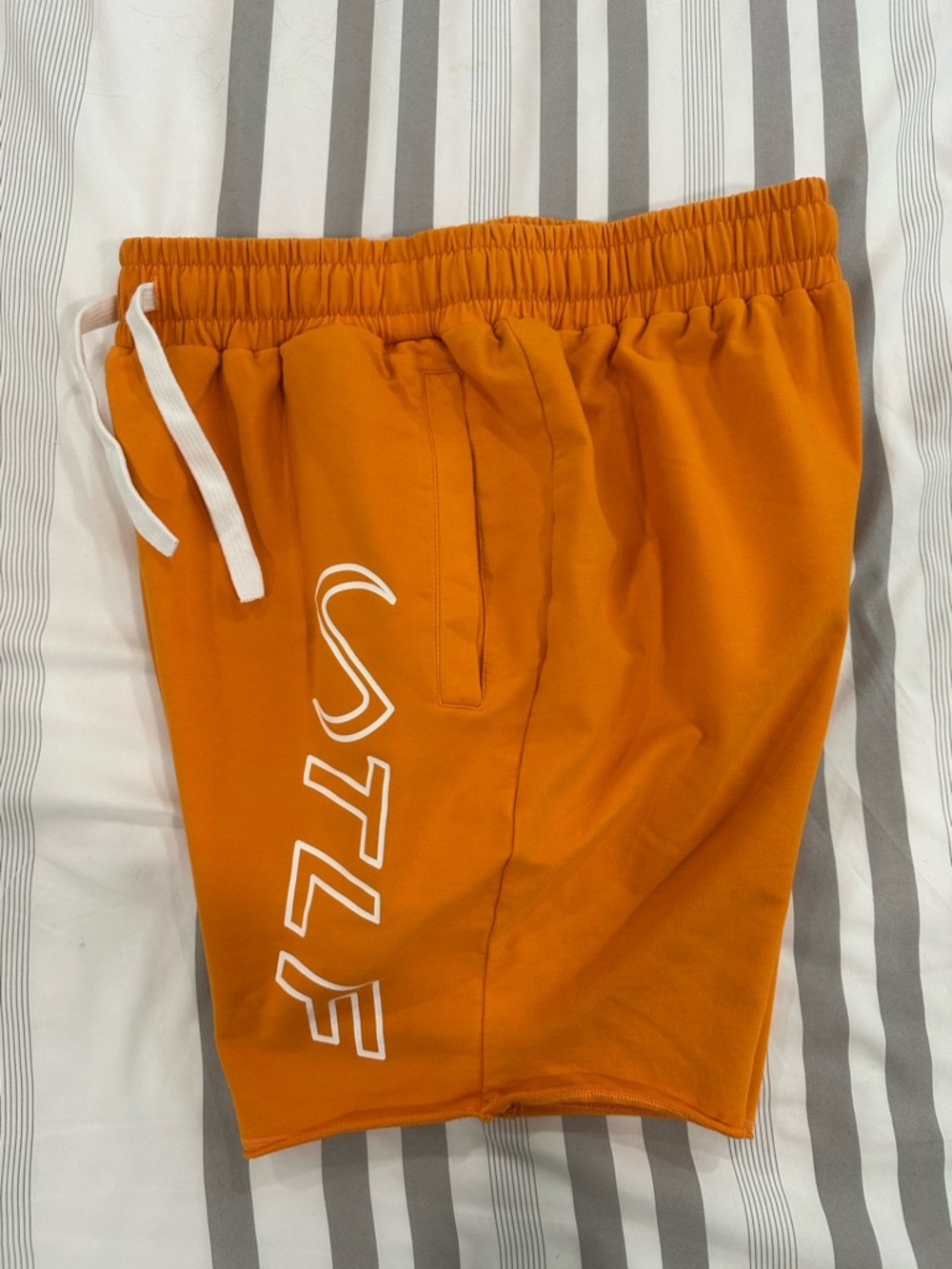 Men's Athletic Orange Drawstring Shorts with TLF Graphic
